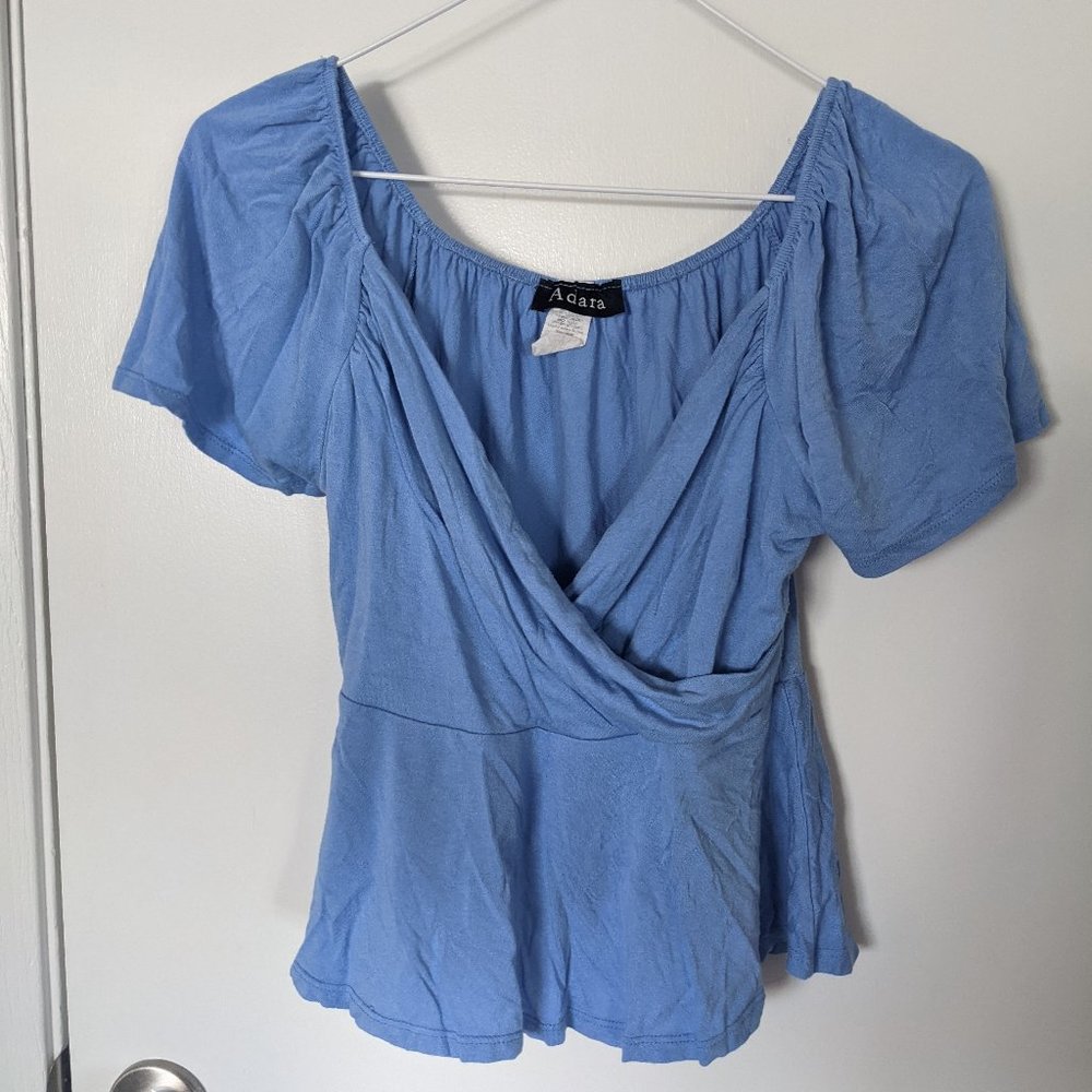 blue wrap top with flowy hem